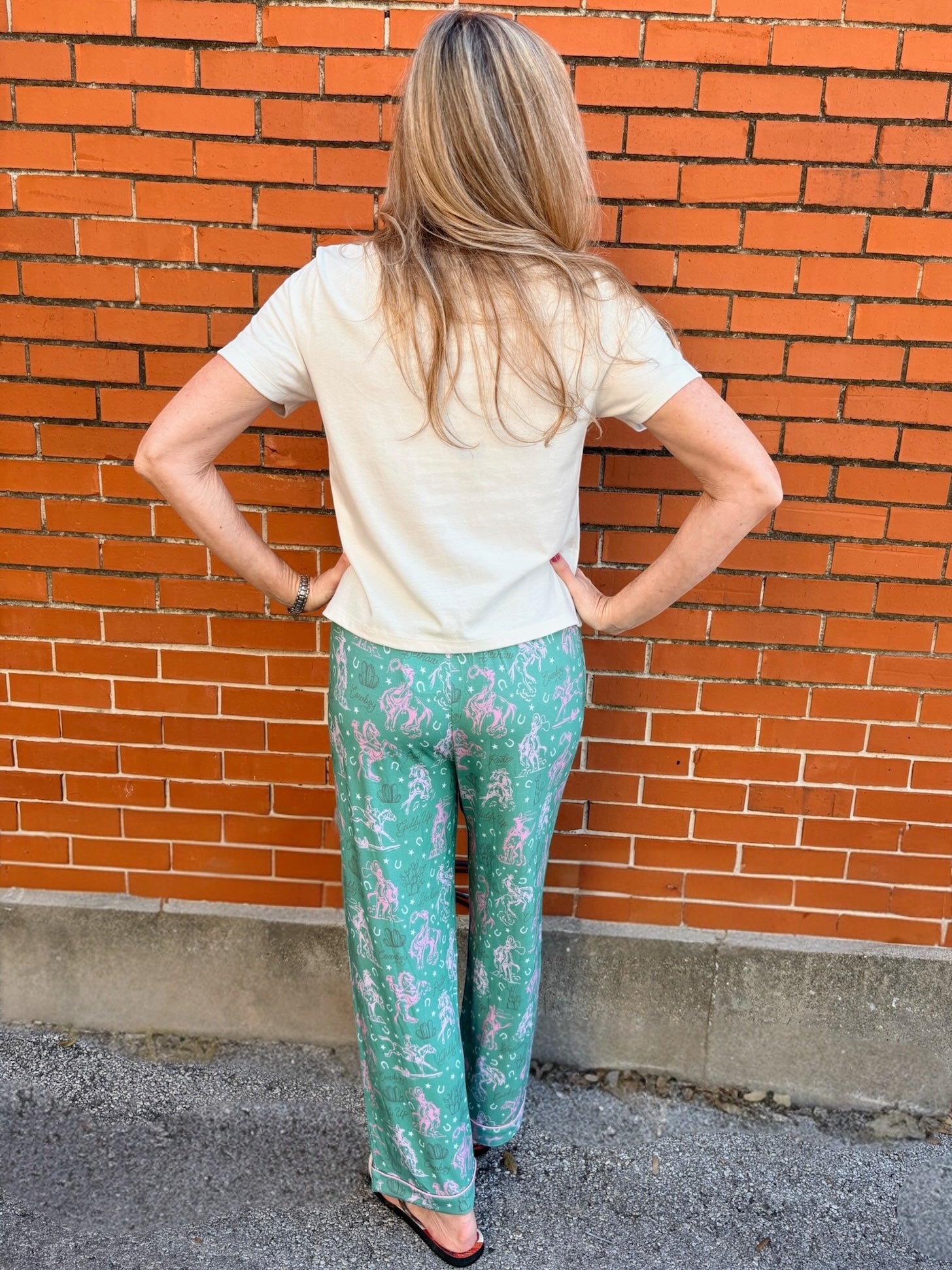 Western pajamas, rodeo print loungewear, soft pajama pants, cowgirl sleepwear, sage green pajamas, unisex pajama bottoms, boho western wear, rodeo lounge pants
at ooh la la! in Grapevine TX 76051