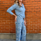 wide leg jeans, embroidered denim, high waisted jeans, floral embroidery, boho jeans, lyocell denim, ankle length jeans, feminine style, premium denim at ooh la la! in Grapevine TX 76051