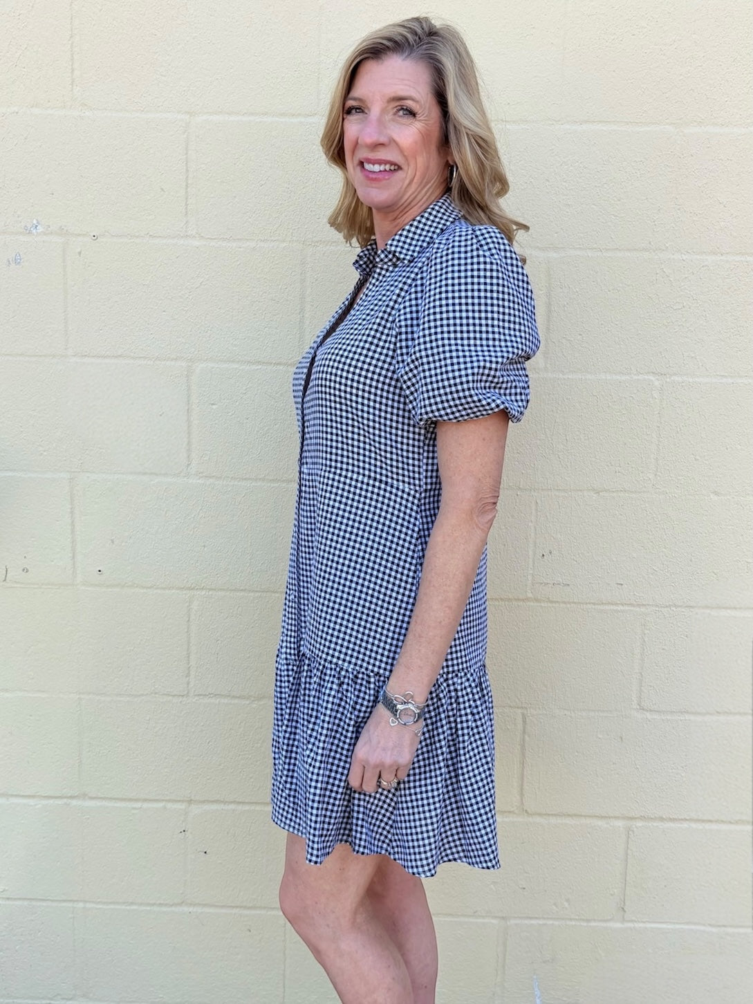 black gingham dress, cotton shirt dress, puff sleeve dress, lightweight summer dress, black and white gingham, women's cotton dress, tiered shirt dress, pebbles dress at ooh la la! in Grapevine TX 76051