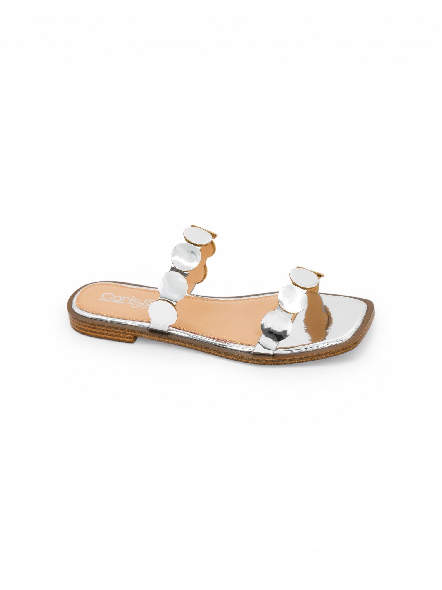 Corky’s footwear, silver flat sandals, square toe slides, metallic circle sandals, women's summer shoes, comfortable dressy flats, slip-on sandals. at ooh la la! in Grapevine TX 76051
