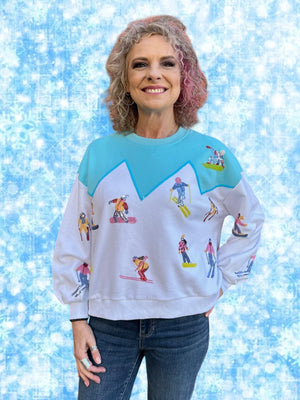 Queen of Sparkles White/Blue Skiers on Mountain Sweatshirt at ooh la la! in Grapevine TX 76051