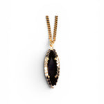TOVA Alyssa Necklace featuring marquise-cut jet crystal pendant on gold chain at ooh la la! in Grapevine TX 76051