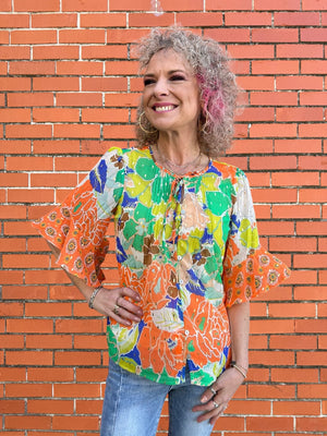 Olive Hill Flutter Sleeve Bright Floral Top at ooh la la! in Grapevine TX 76051