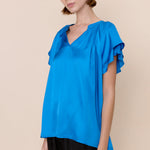 Sofia Caroline Satin Blouse in cerulean blue at ooh la la! in Grapevine TX 76051