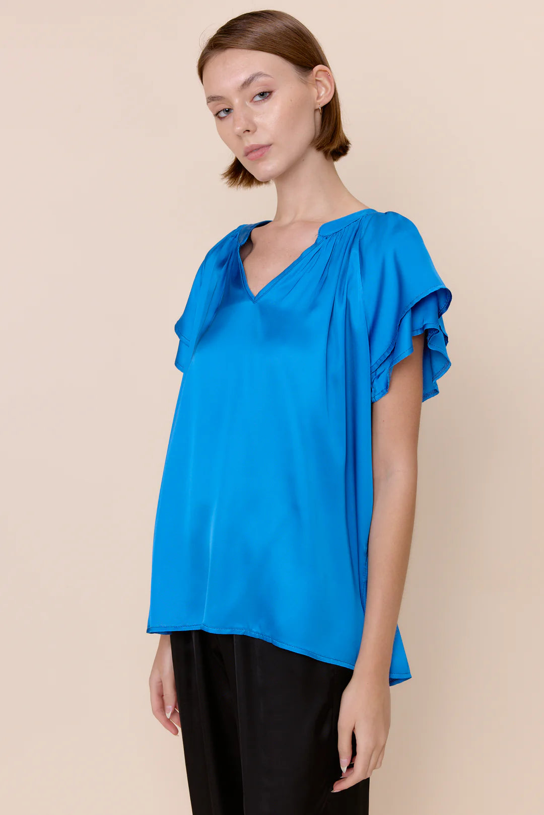 Sofia Caroline Satin Blouse in cerulean blue at ooh la la! in Grapevine TX 76051
