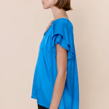 Sofia Caroline Satin Blouse in cerulean blue at ooh la la! in Grapevine TX 76051