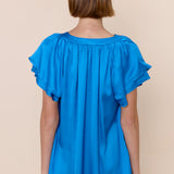 Sofia Caroline Satin Blouse in cerulean blue at ooh la la! in Grapevine TX 76051