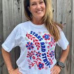 Patriotic Women's Apparel, Americana Tee, 4th of July Shirt, Floral Stars and Stripes, Premium Slub Cotton, Women's Graphic Tee, Red White and Blue Fashion, Summer Patriotic Tops. at ooh la la! in Grapevine TX 76051
