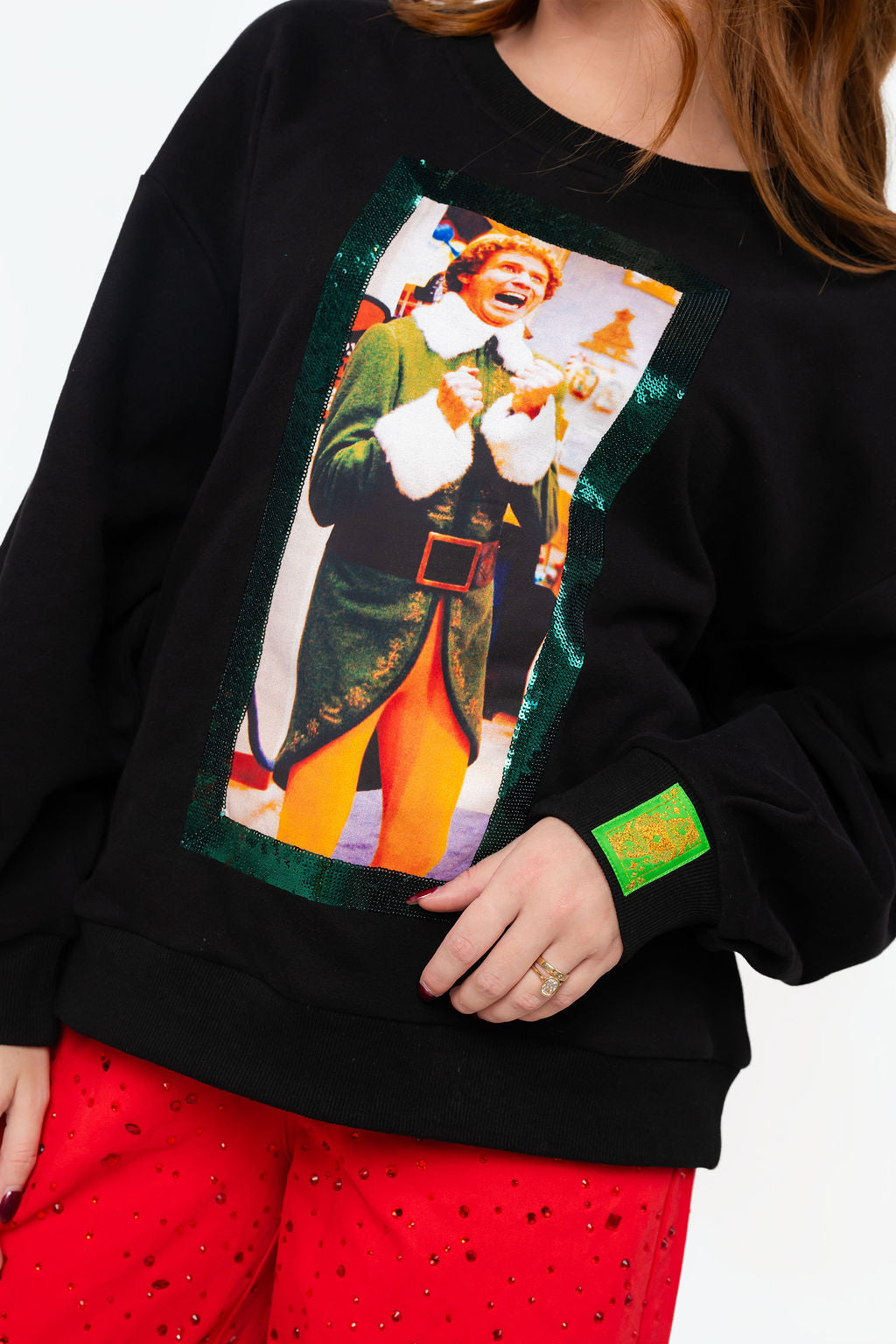 Queen of Sparkles Licensed Black Buddy Yelling Screenprint Sweatshirt at ooh la la! in Grapevine TX 76051