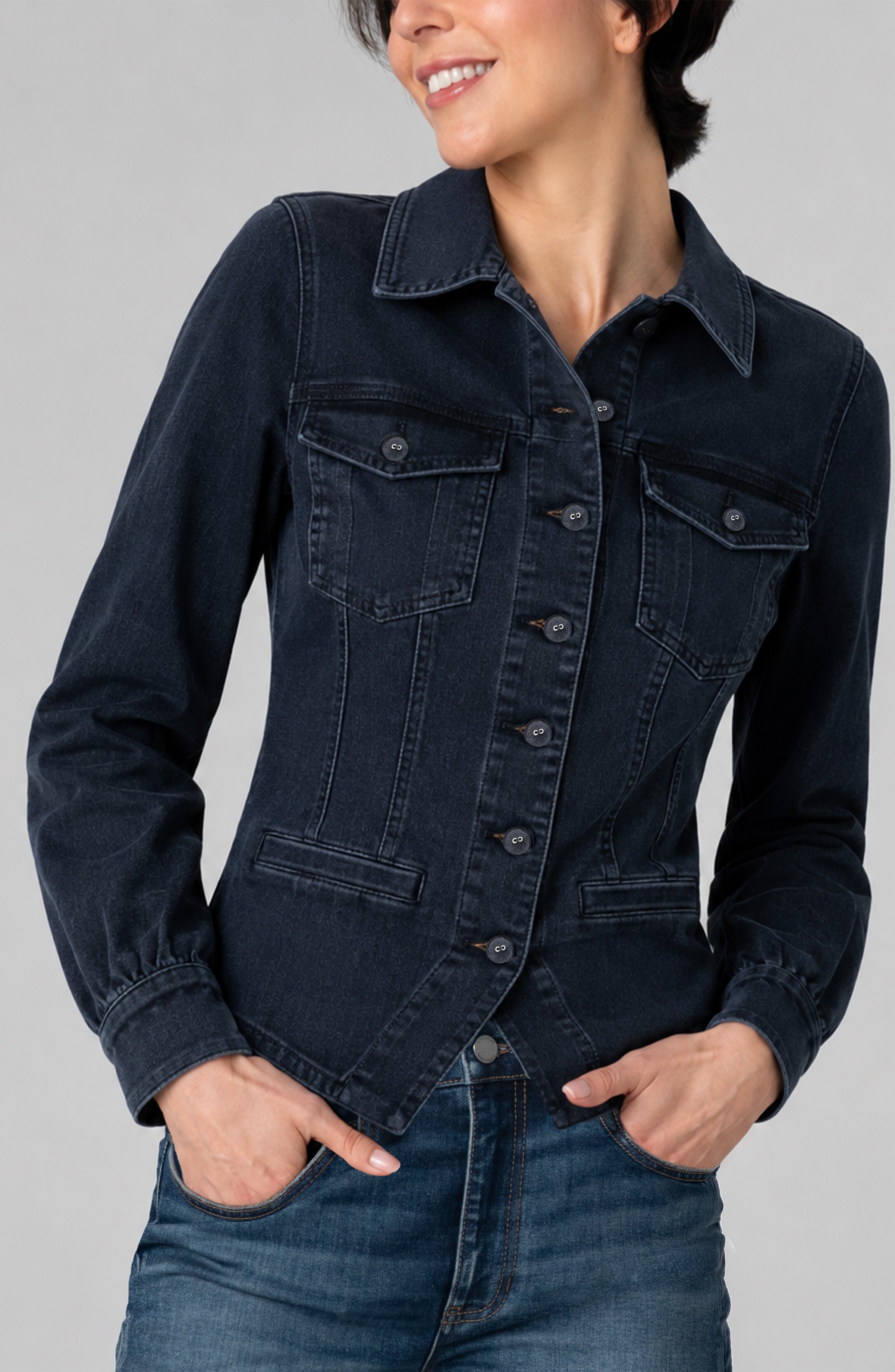 Woman wearing Liverpool fitted dark navy denim jacket with patch pockets and button front