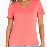 Liverpool short sleeve v-neck tee in sunset coral worn with light wash jeans
