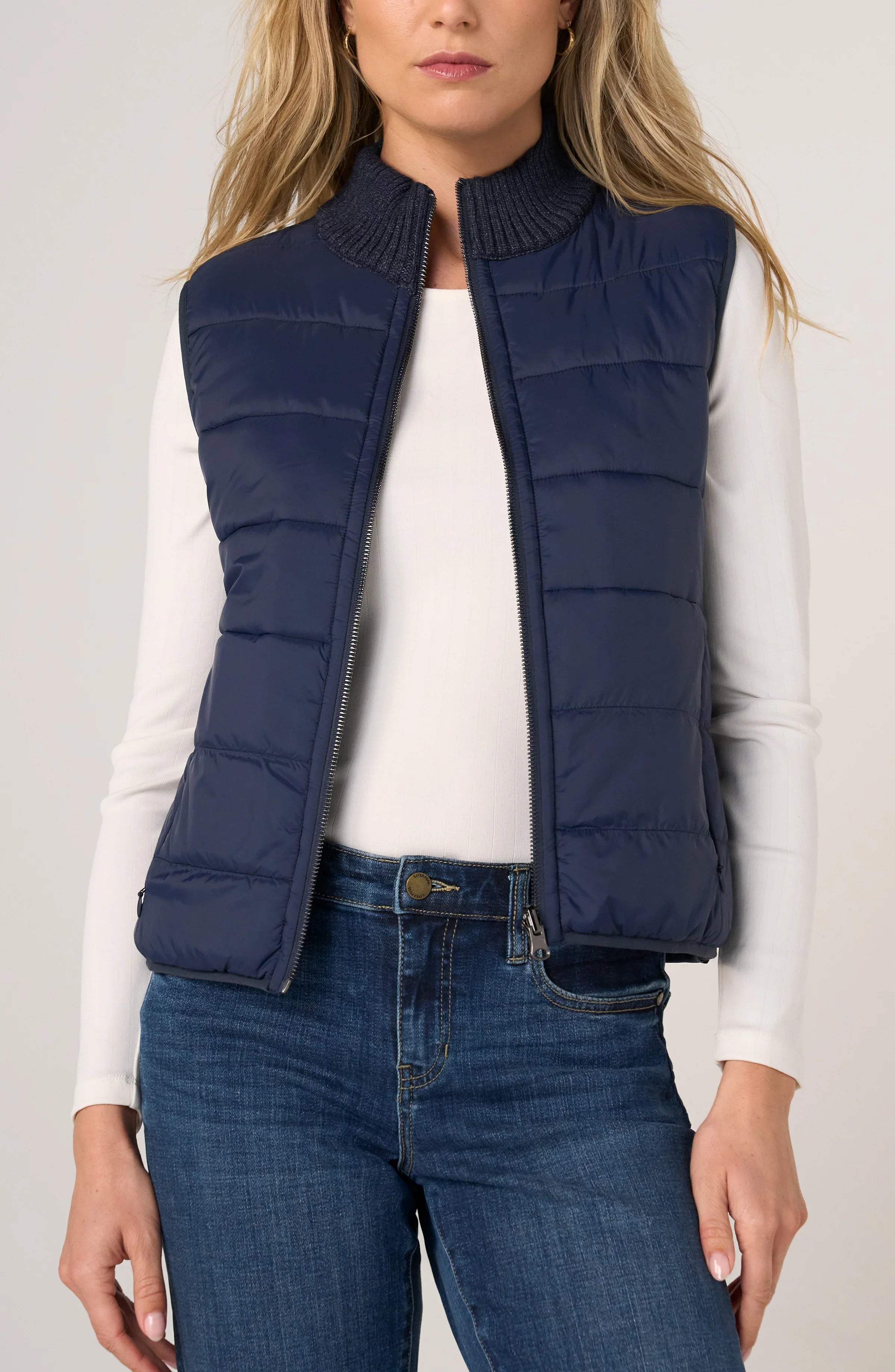 Liverpool Reversible Zip Front Quilted Sweater Vest in Heather Navy worn open over white top
