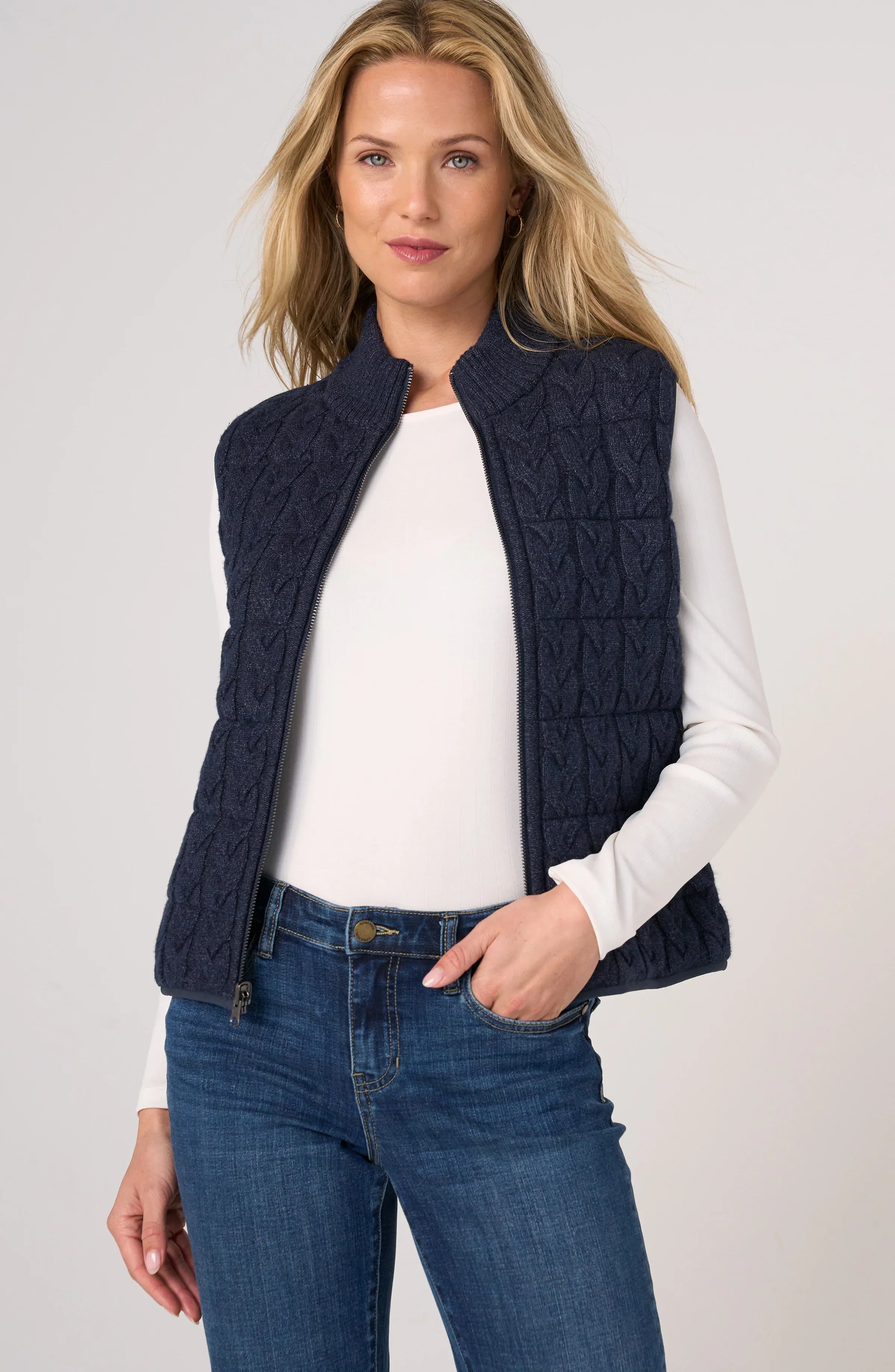 Liverpool Reversible Zip Front Quilted Sweater Vest in Heather Navy worn over white top with jeans