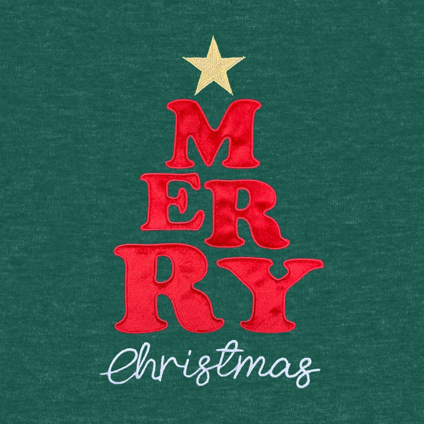 The graphic features the word "MERRY" stacked vertically in large, plush red appliqué/embroidered letters forming a Christmas tree shape, topped with a small gold star. The word "Christmas" is written in white script underneath.