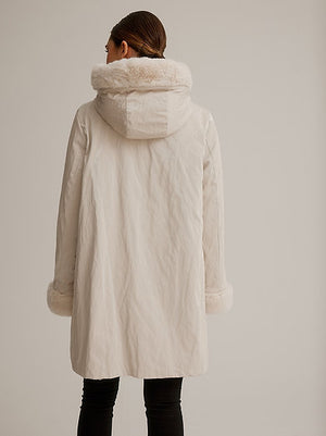 Nikki Jones Reversible Fur/Luster Rain Hooded Coat in Cream at ooh la la! in Grapevine TX 76051