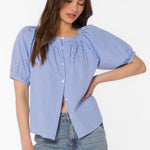 Blue gingham top, cotton peasant blouse, puff sleeve shirt, women's summer tops, blue and white gingham, lightweight cotton top, button-down blouse, cottagecore style.
at ooh la la in Grapevine TX 76051