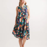 Navy floral swing dress, sleeveless Henley dress, lightweight viscose sundress, abstract print summer dress, casual floral dress with pockets, women's flowy summer fashion. at ooh la la! in Grapevine TX 76051