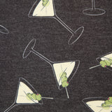 Pattern of martini glasses with frogs on a dark background