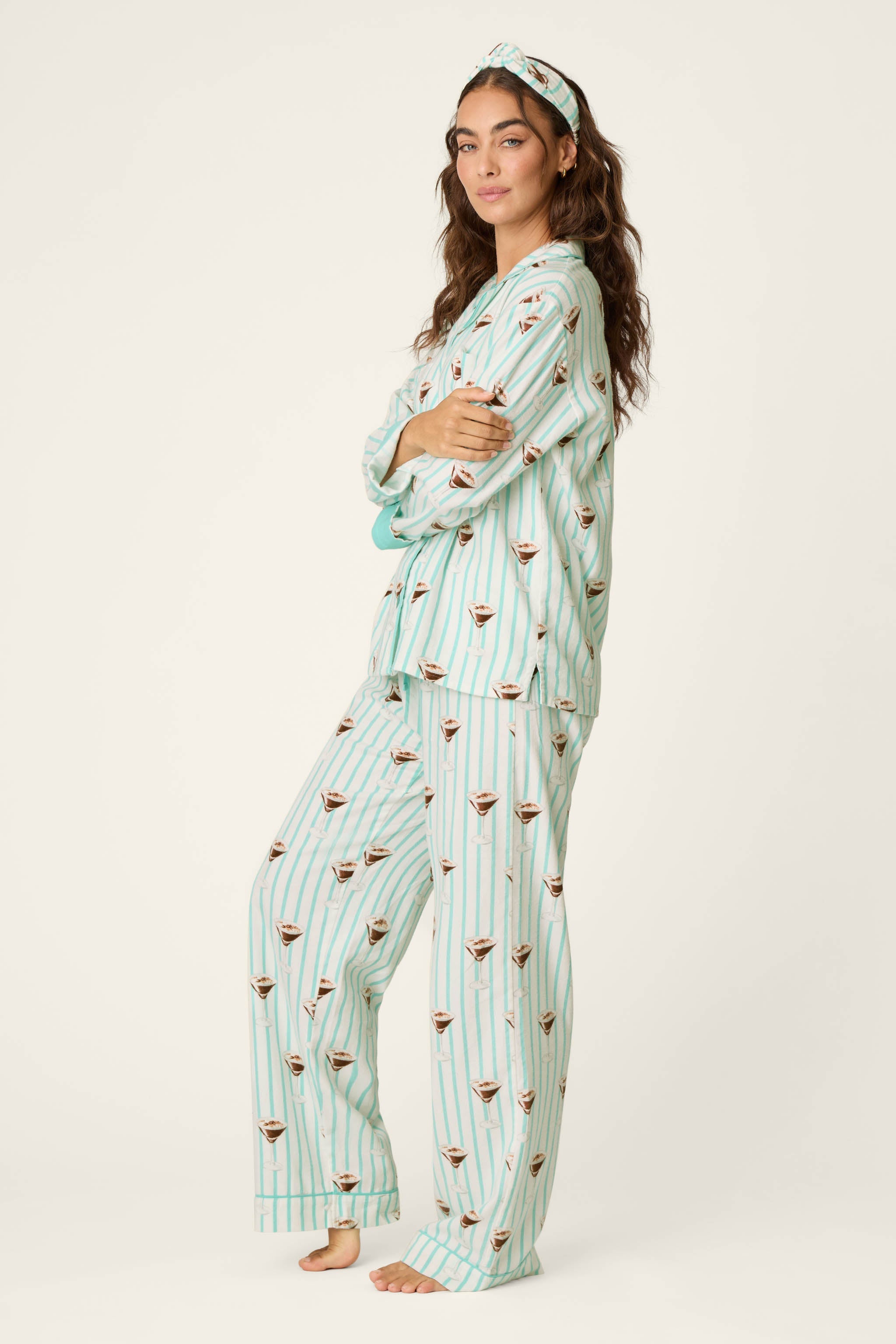 Woman wearing mint striped espresso martini print long sleeve flannel PJ set with eye mask
