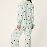 Woman modeling PJ Salvage espresso martini print teal striped three-piece flannel pajama set, back view