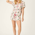 Woman wearing PJ Salvage Saddle Up Western Print nude 3-piece pajama set with eye mask