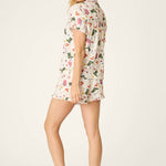 Woman modeling PJ Salvage Saddle Up Western Print short sleeve pajama set in nude