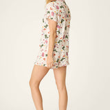 Woman modeling PJ Salvage Saddle Up Western Print short sleeve pajama set in nude