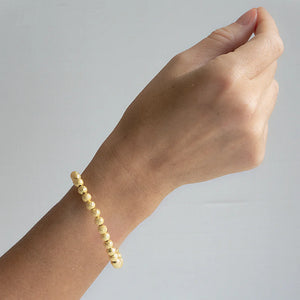 Lenny & Eva 6MM Gold Stretch Bracelet in Sparkle at ooh la la! in Grapevine TX 76051