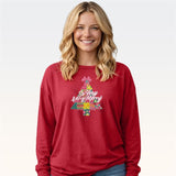 Woman wearing red long sleeve tee with colorful Christmas tree So Very Merry graphic