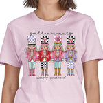 Simply Southern Y'all Are Nuts Nutcracker graphic tee in peony pink on smiling model