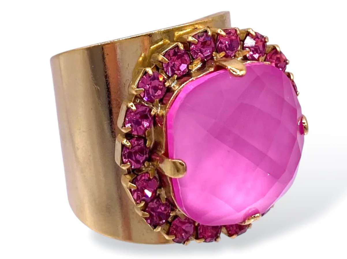 TOVA Cambrie Ring in Pink featuring large faceted hot pink stone with fuchsia crystal halo on wide gold band at ooh la la! in Grapevine TX 76051