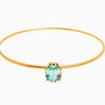Tova Ada Bangle gold thin band bracelet featuring a light turquoise emerald-cut crystal stone