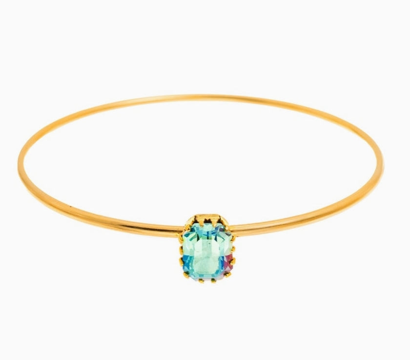 Tova Ada Bangle gold thin band bracelet featuring a light turquoise emerald-cut crystal stone