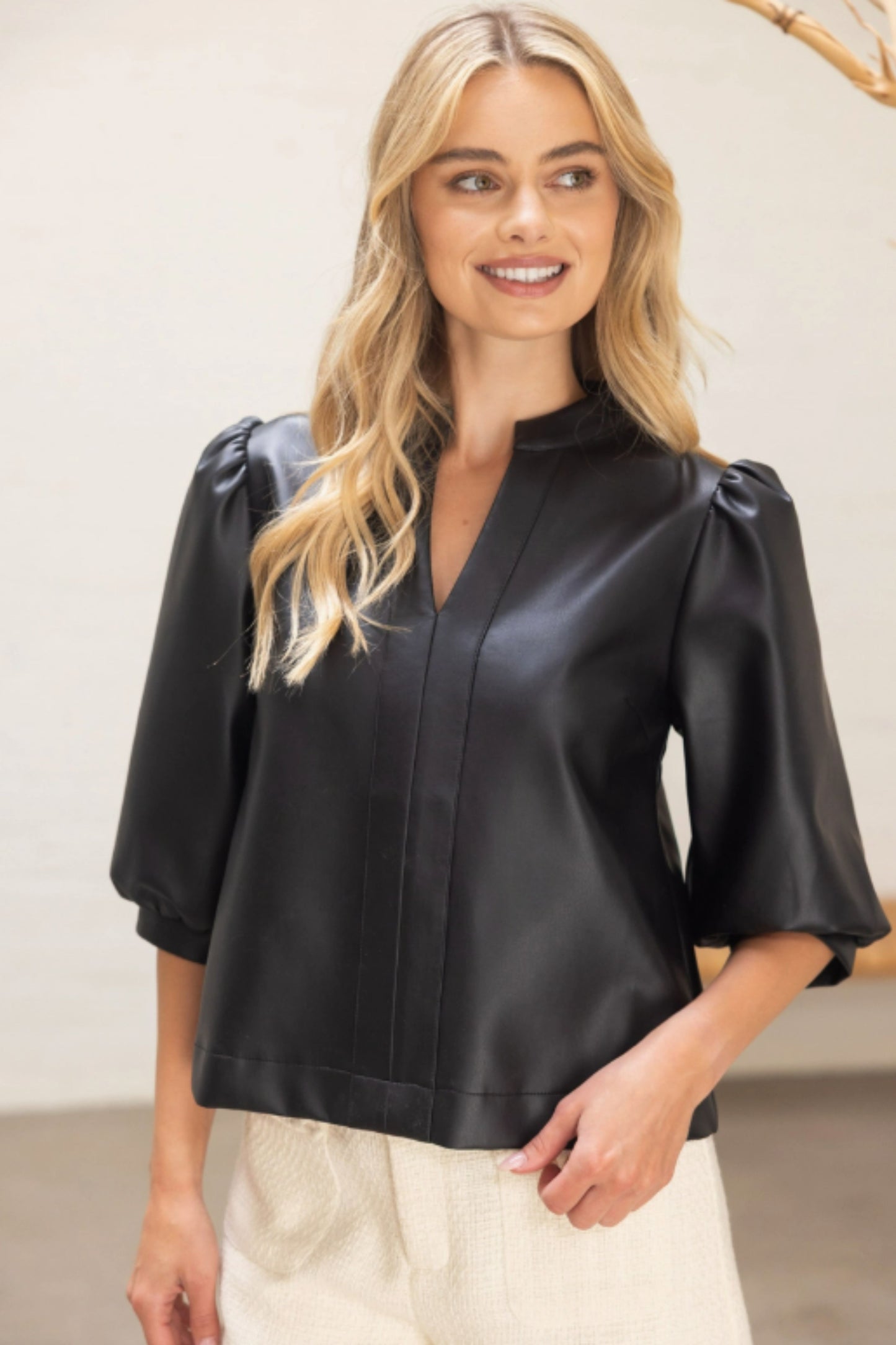Puff Sleeve Faux Leather Top at ooh la la! in Grapevine TX 76051