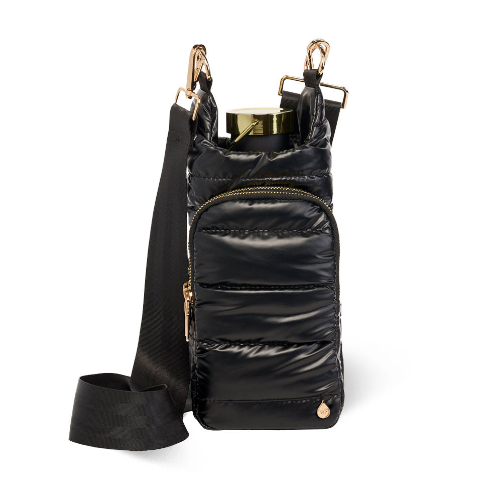 Wanderfull black shiny quilted HydroBag with gold hardware and crossbody strap