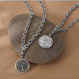 Brighton Interlok Tree of Life Necklace showing front and back of silver medallion pendant