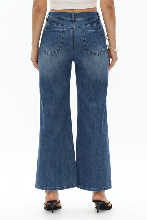 Toronto flare jeans, embroidered denim, scalloped hem jeans, mid rise flare, vine motif jeans, boho chic denim, distressed wide leg, women’s designer jeans, Lyocell denim at ooh la la! in Grapevine TX 76051