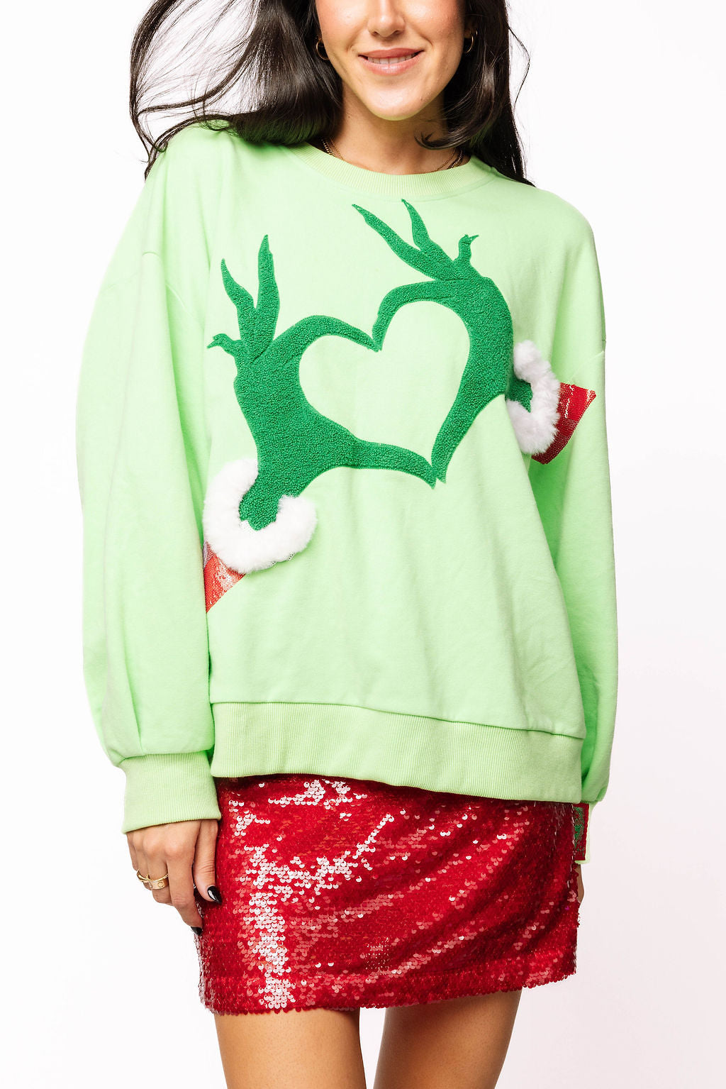 Queen of Sparkles Green Grinch Heart Hands Sweatshirt at ooh la la! in Grapevine TX 76051