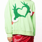 Queen of Sparkles Green Grinch Heart Hands Sweatshirt at ooh la la! in Grapevine TX 76051