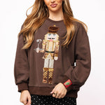 Brown Espresso Martini Serving Nutcracker Sweatshirt at ooh la la! in Grapevine TX 76051