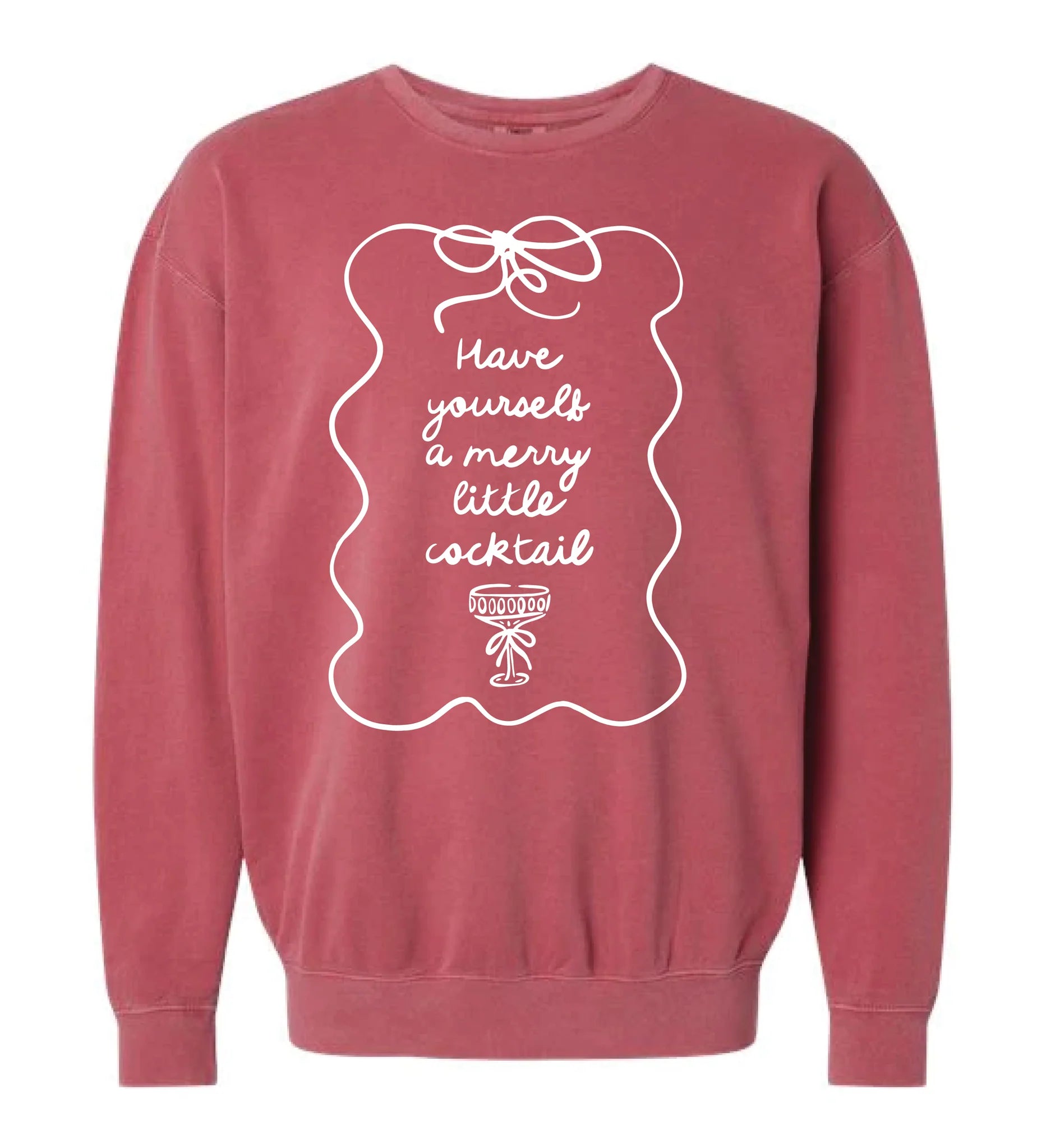 Mauve or dusty rose pigment-dyed crewneck sweatshirt featuring a whimsical white line graphic framing the text "Have yourself a merry little cocktail" above a drawing of a decorated martini glass.