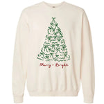 Cream or natural-colored crewneck long-sleeve tee featuring a simple, hand-drawn-style graphic of a Christmas tree made entirely of small green bows, with the phrase "Merry + Bright" written underneath in red and green script.