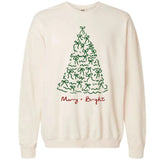 Cream or natural-colored crewneck long-sleeve tee featuring a simple, hand-drawn-style graphic of a Christmas tree made entirely of small green bows, with the phrase "Merry + Bright" written underneath in red and green script.