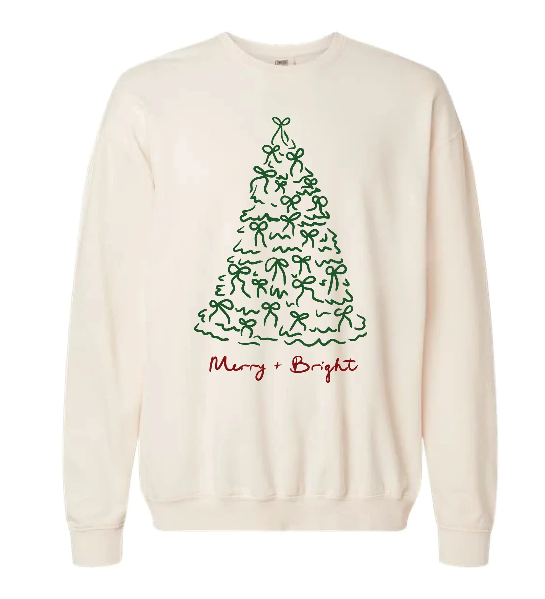 Cream or natural-colored crewneck long-sleeve tee featuring a simple, hand-drawn-style graphic of a Christmas tree made entirely of small green bows, with the phrase "Merry + Bright" written underneath in red and green script.