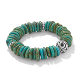 Brighton turquoise stretch bracelet with silver accent beads on white background