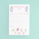 Taylor Paladino Mahjong Scorepad with pink grid, ginger jar illustrations, and mahjong tile artwork