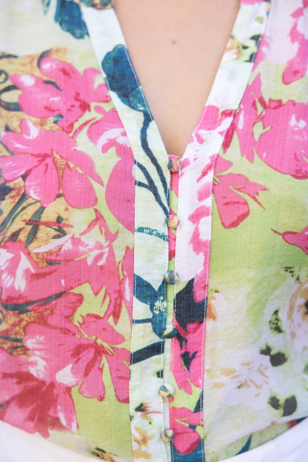 floral puff sleeve blouse, lightweight summer top, women's v-neck floral shirt, button down floral top, boutique spring fashion, breezy floral blouse at ooh la la in Grapevine TX 76051