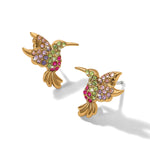 Gold hummingbird stud earrings with colorful crystal embellishments on white background