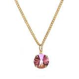 Pink TOVA Talia, crystal pendant necklace, antique gold jewelry, handcrafted Canadian jewelry, adjustable gold necklace, charm-compatible necklace, luxury fashion accessories, gold plated brass chain.
at ooh la la! in Grapevine TX 76051