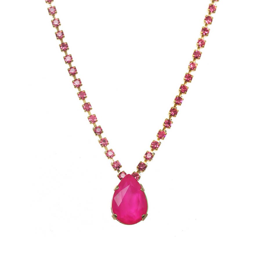 Electric Pink TOVA Milli Necklace, Swarovski crystal jewelry, gold plated teardrop necklace, electric blue pendant, pink crystal necklace, luxury statement jewelry, designer brass necklace, vibrant crystal pendant. at ooh la la! in Grapevine TX 76051